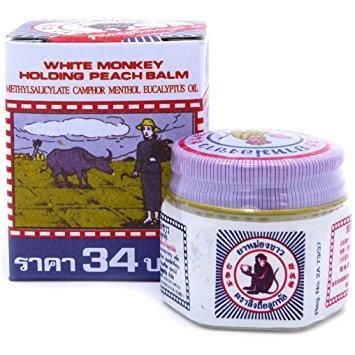 White Monkey Holding Peach Balm